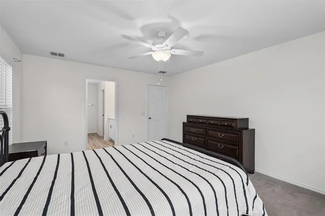 a workspace with furniture and a window