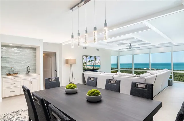 a kitchen with stainless steel appliances a stove microwave and cabinets