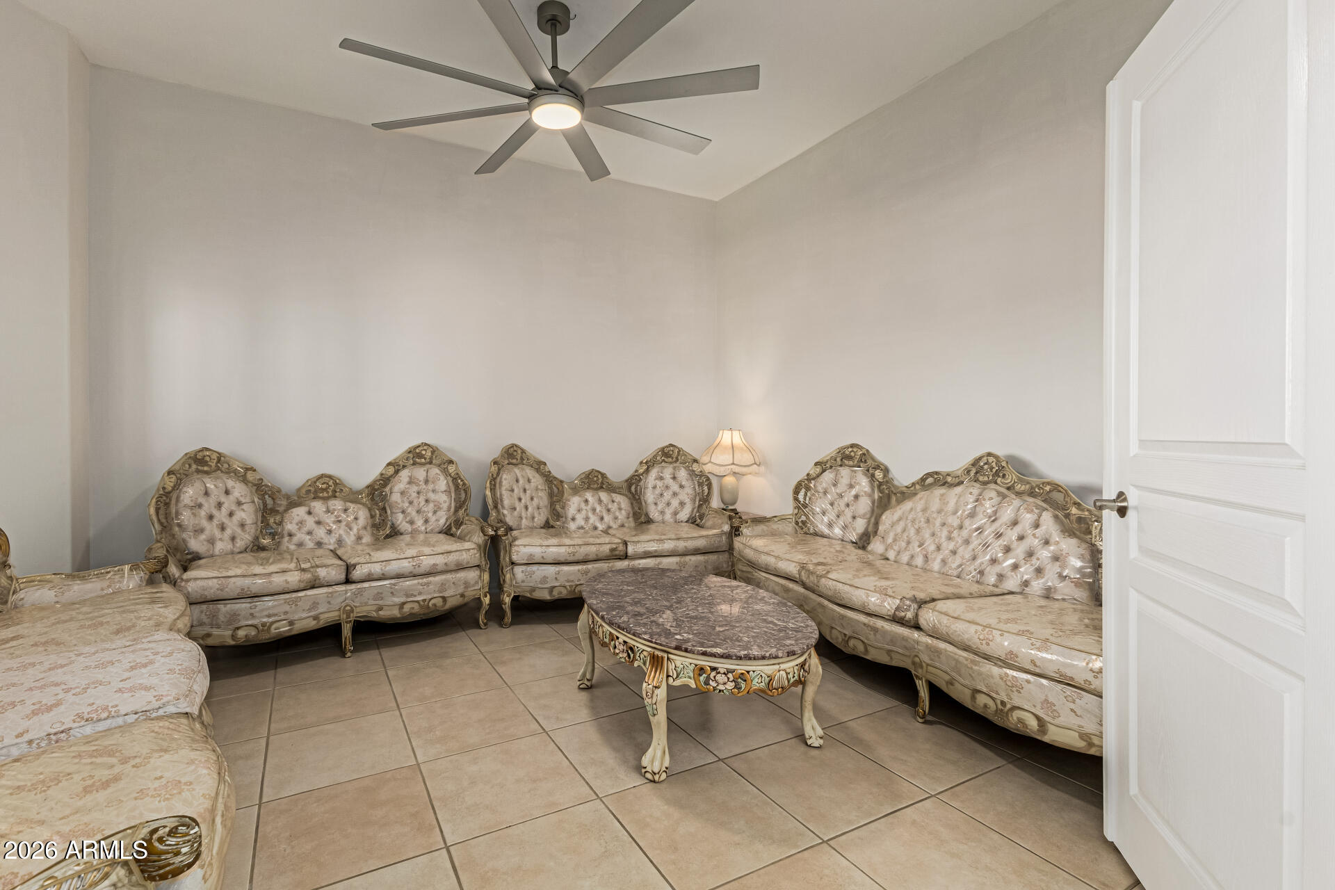 12607 West Ocotillo Road Glendale, AZ 85307 - Photo 16 of 52 a living room with furniture and a couch
