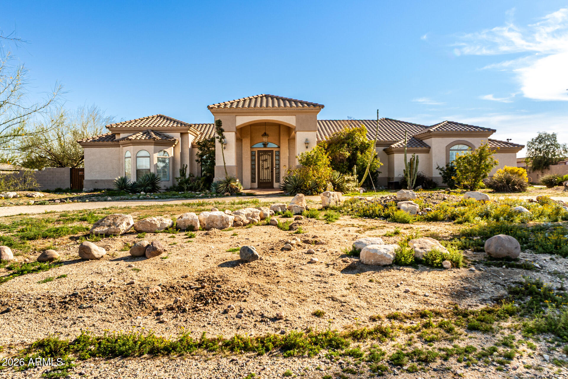 12607 West Ocotillo Road Glendale, AZ 85307 - Photo 2 of 52 a front view of a house with a yard