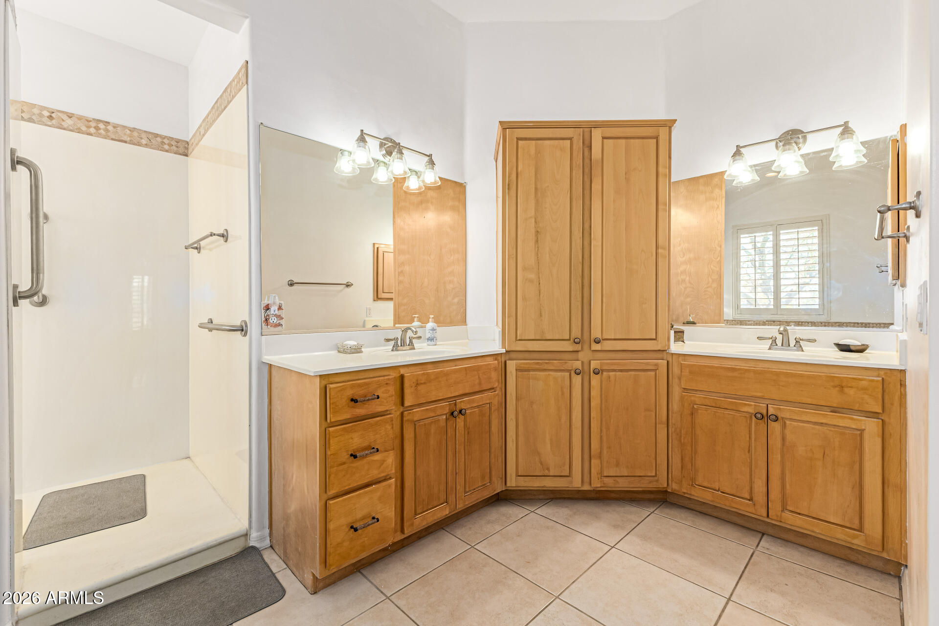 12607 West Ocotillo Road Glendale, AZ 85307 - Photo 28 of 52 a spacious bathroom with a granite countertop sink mirror and a