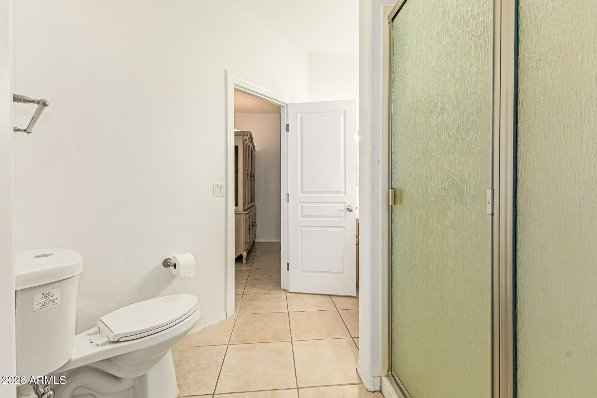 12607 West Ocotillo Road Glendale, AZ 85307 - Photo 33 of 52 a bathroom with a toilet and a shower