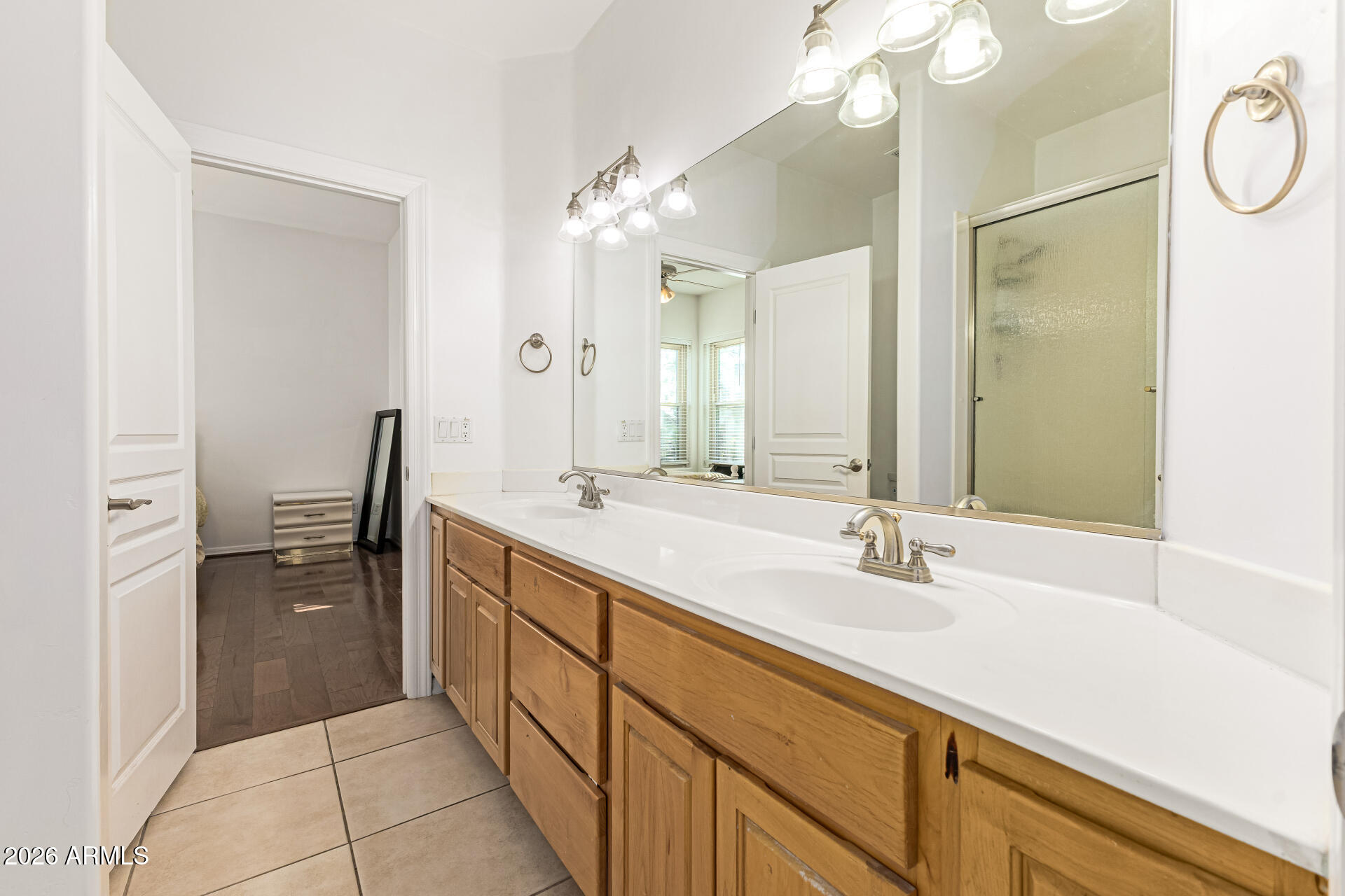 12607 West Ocotillo Road Glendale, AZ 85307 - Photo 39 of 52 a spacious bathroom with a double vanity sink mirror and shower