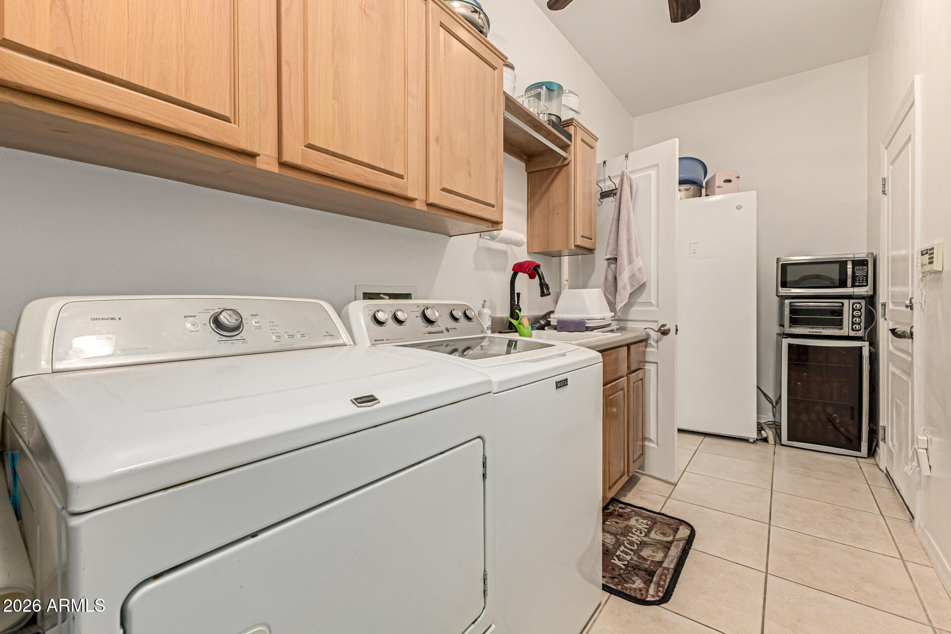 12607 West Ocotillo Road Glendale, AZ 85307 - Photo 41 of 52 a utility room with dryer and washer