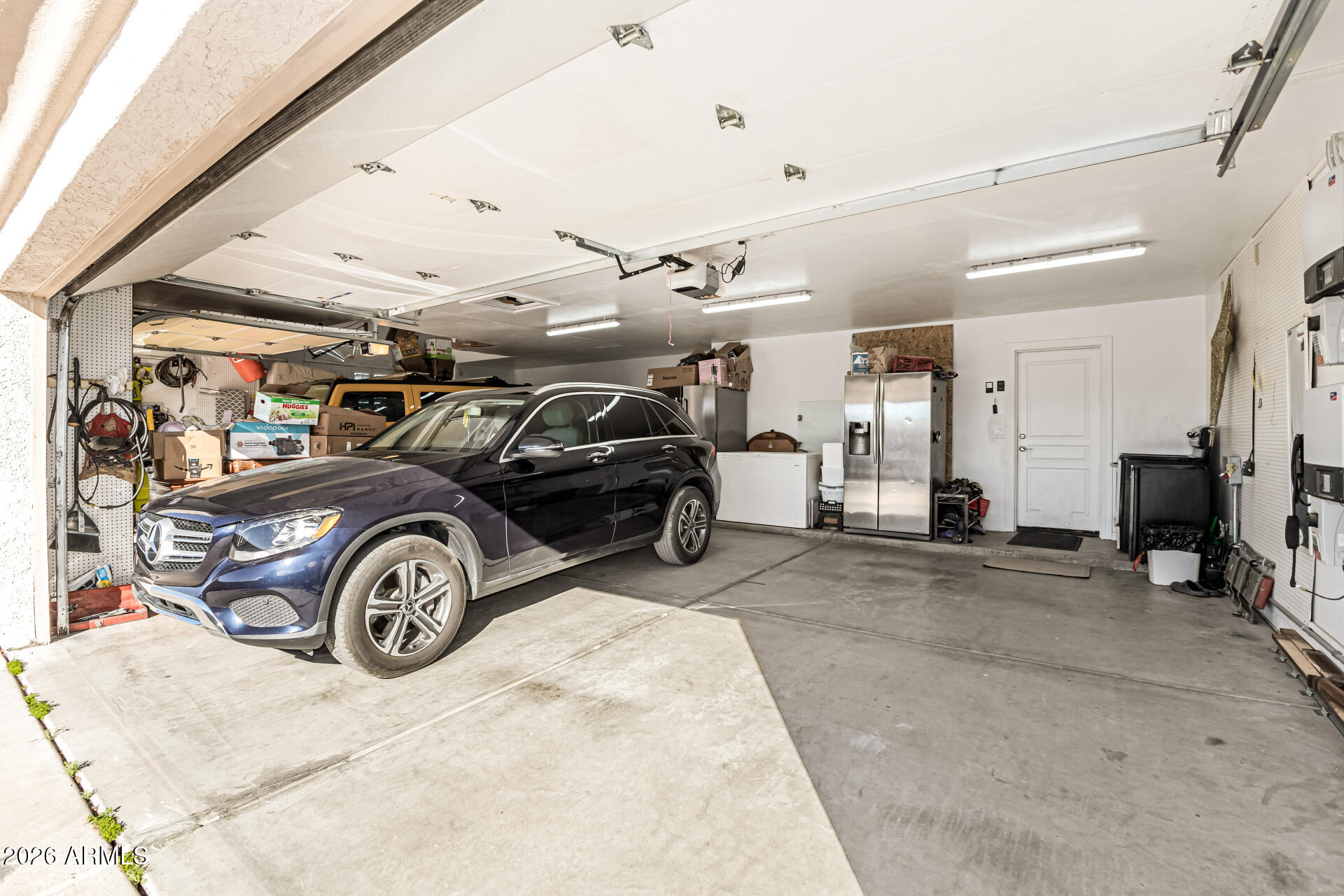 12607 West Ocotillo Road Glendale, AZ 85307 - Photo 42 of 52 a view of a garage with parked cars