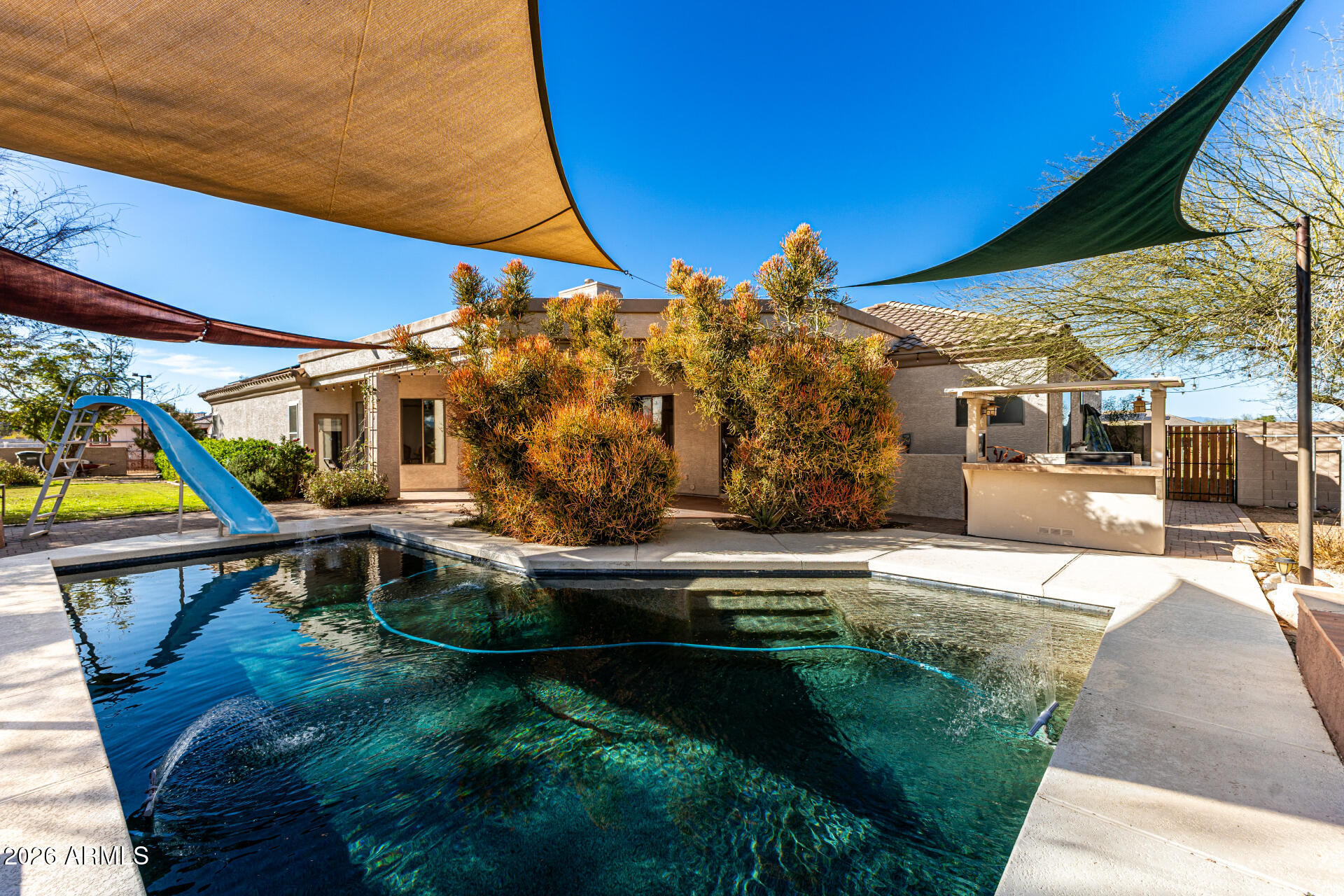 12607 West Ocotillo Road Glendale, AZ 85307 - Photo 45 of 52 a view of swimming pool with a patio