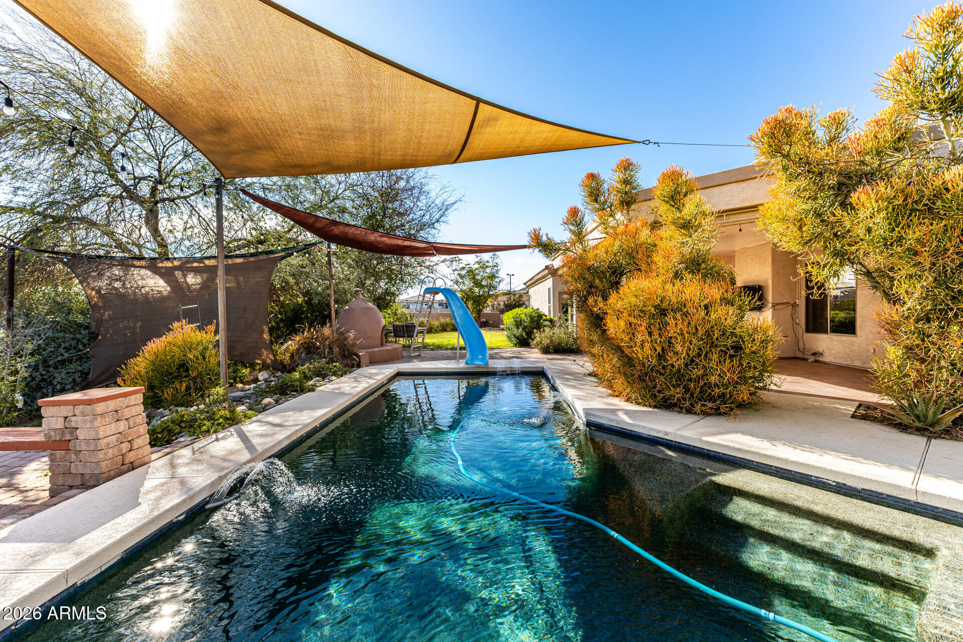 12607 West Ocotillo Road Glendale, AZ 85307 - Photo 46 of 52 a view of a house with a yard