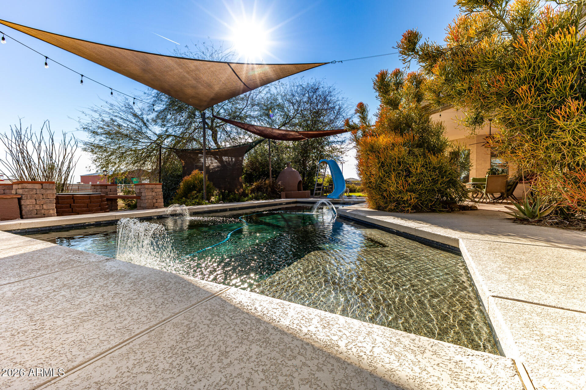 12607 West Ocotillo Road Glendale, AZ 85307 - Photo 48 of 52 a view of swimming pool with a patio