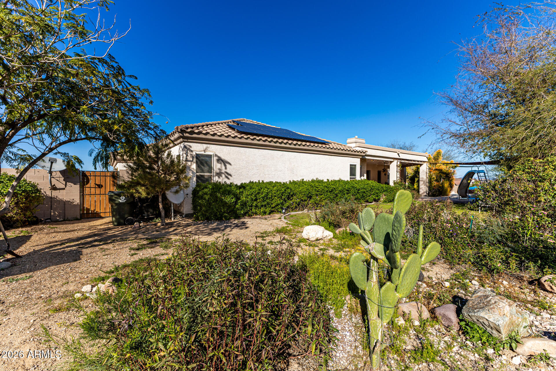 12607 West Ocotillo Road Glendale, AZ 85307 - Photo 49 of 52 a view of a house with a tree