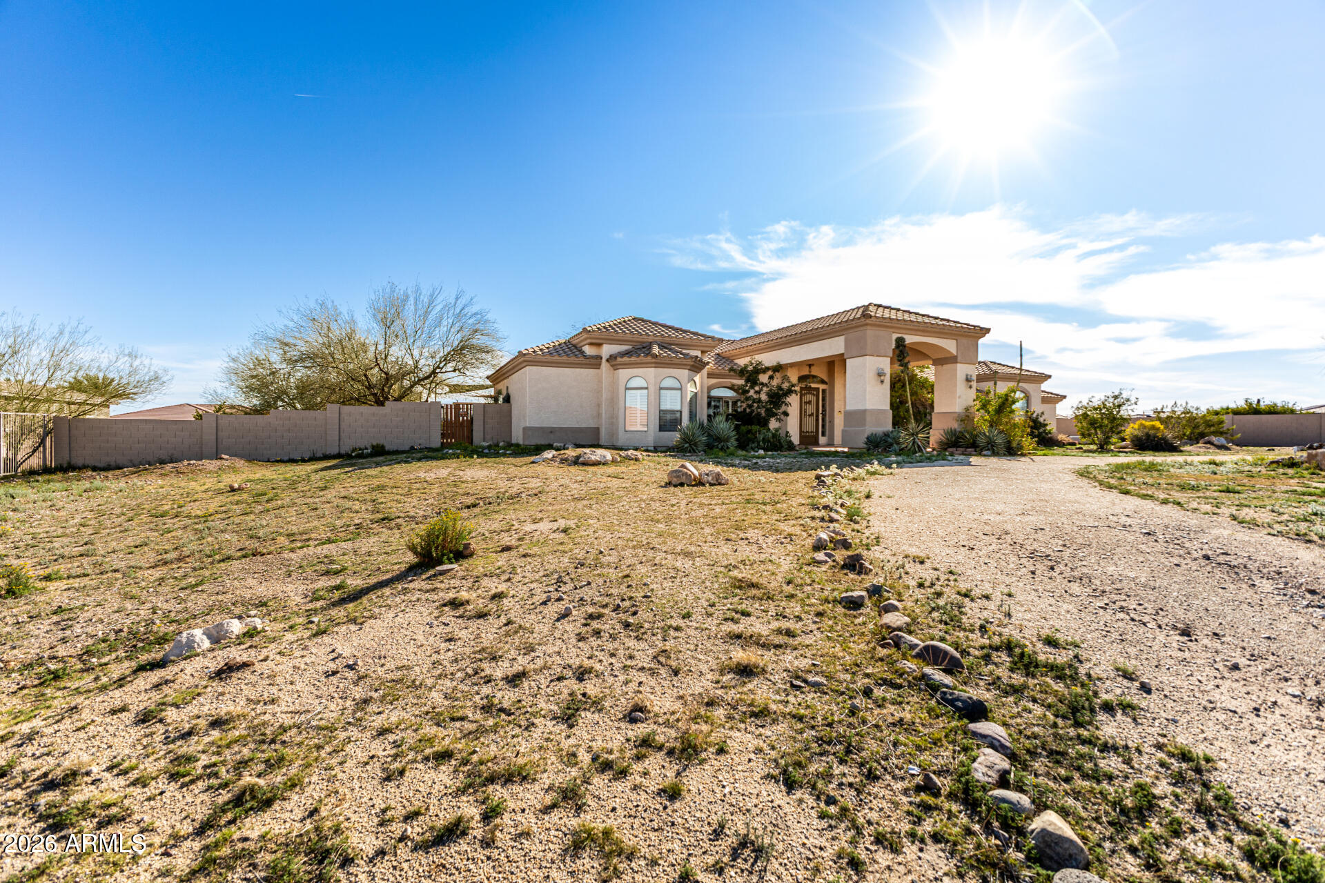 12607 West Ocotillo Road Glendale, AZ 85307 - Photo 5 of 52 a view of a yard with snow on the road