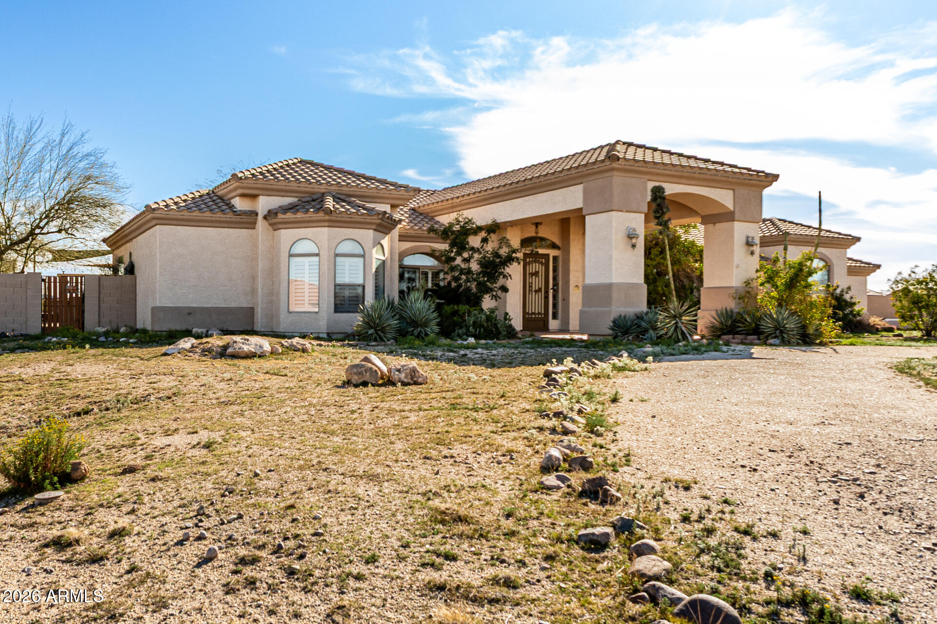 12607 West Ocotillo Road Glendale, AZ 85307 - Photo 6 of 52 a front view of a house with a yard