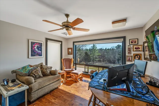 a view of a patio with a table and chairs
