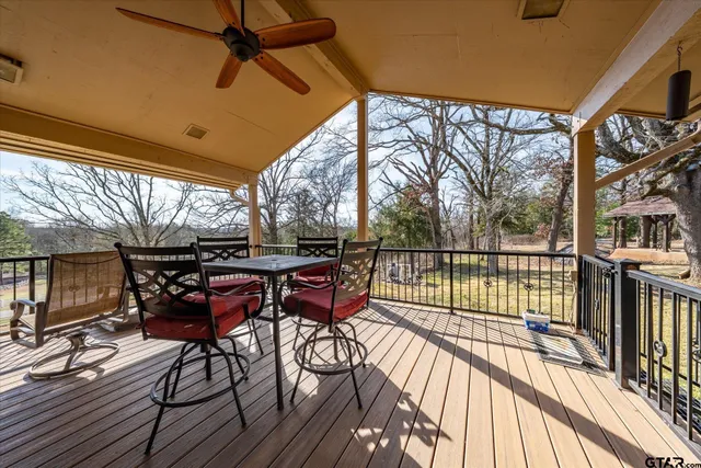 a view of a chairs on the roof deck