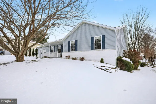 a view of a house with snow on the snow
