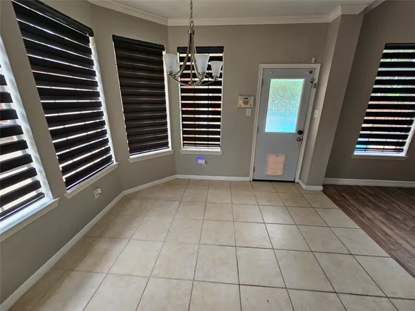 a view of an empty room with a sink