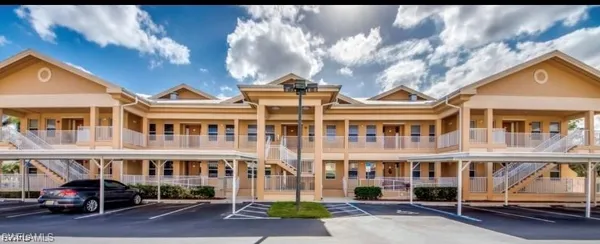 a front view of a building with street view