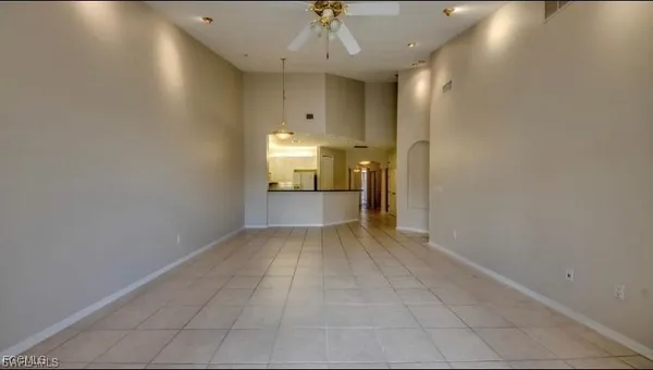 a view of a kitchen with a sink and a stove top oven