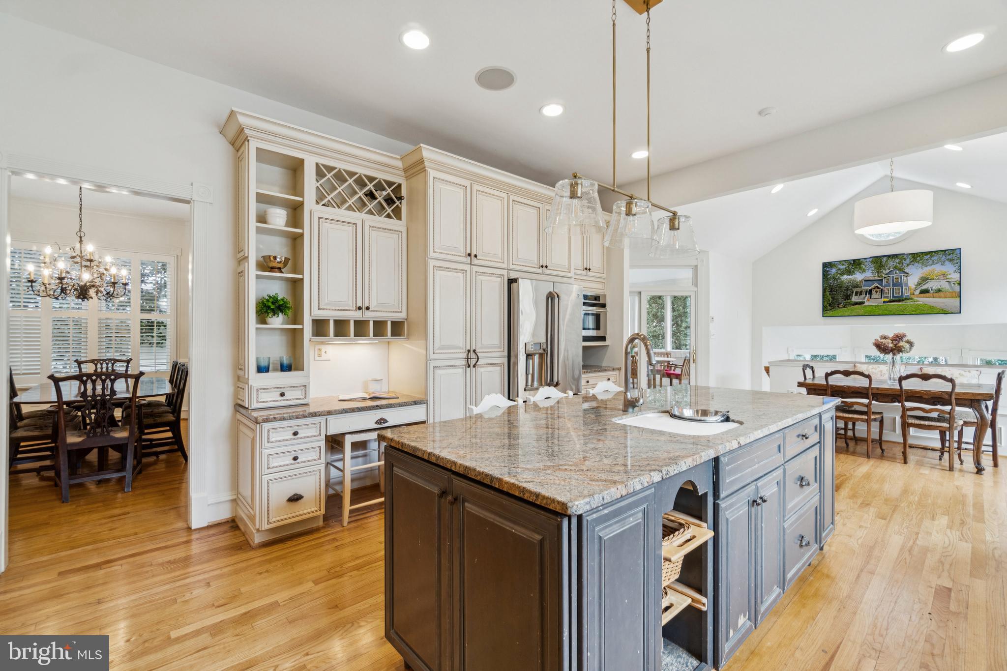 4406 Stanford Street Chevy Chase, MD 20815 - Photo 13 of 49 a open kitchen with stainless steel appliances granite countertop a stove and refrigerator