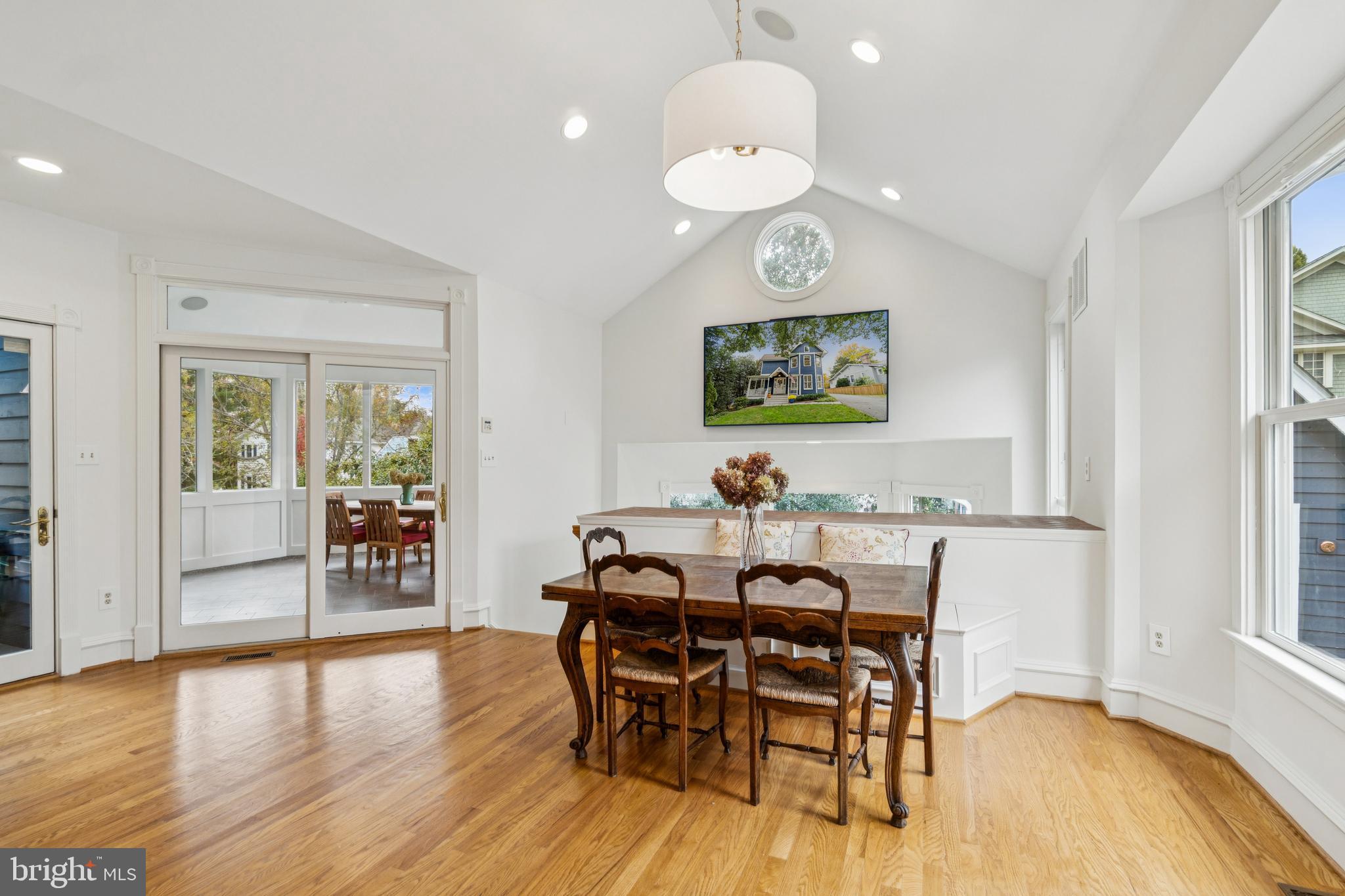 4406 Stanford Street Chevy Chase, MD 20815 - Photo 14 of 49 a view of a dining room with furniture and wooden floor