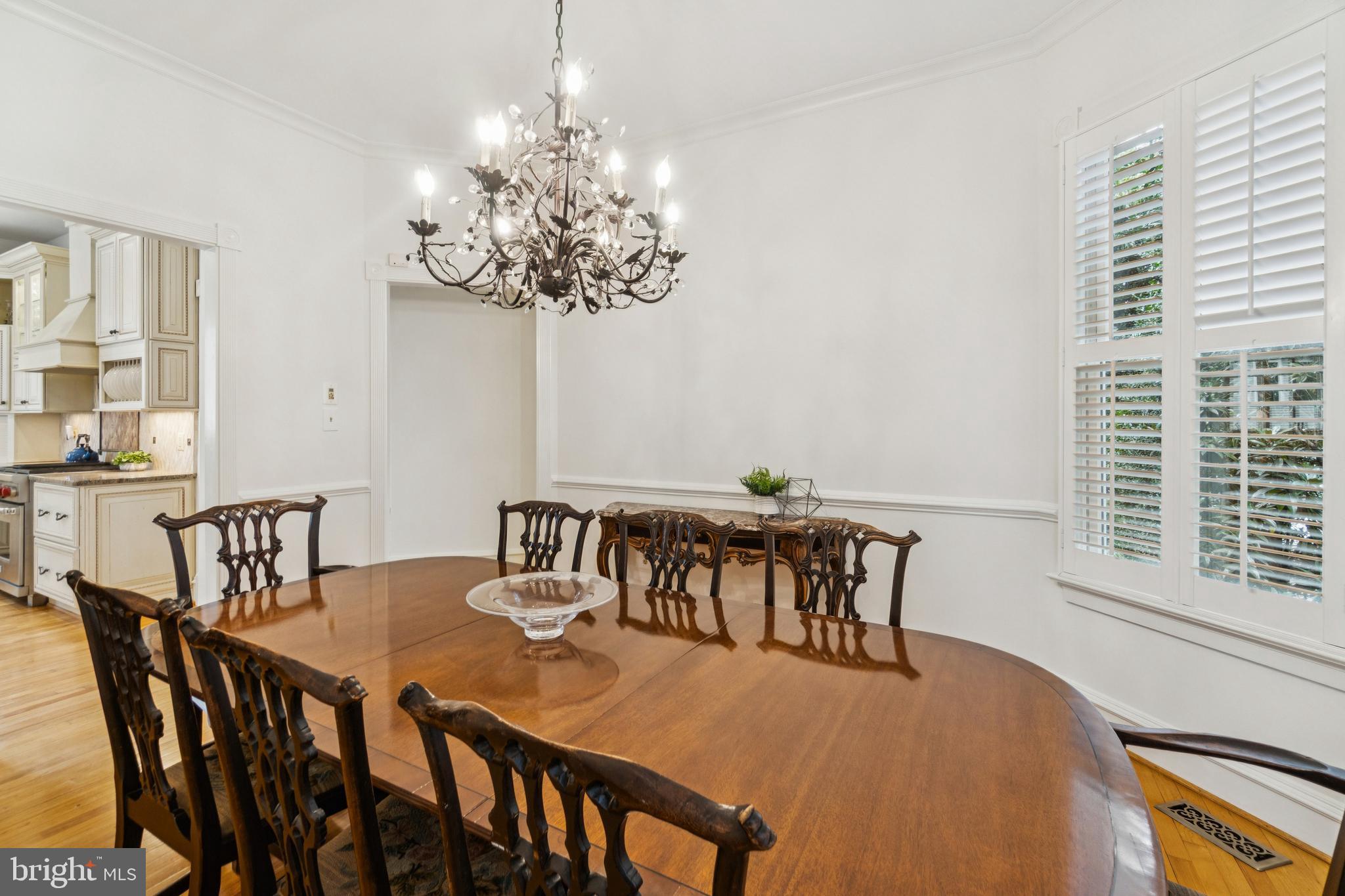 4406 Stanford Street Chevy Chase, MD 20815 - Photo 16 of 49 a view of a dining room with furniture window and outside view