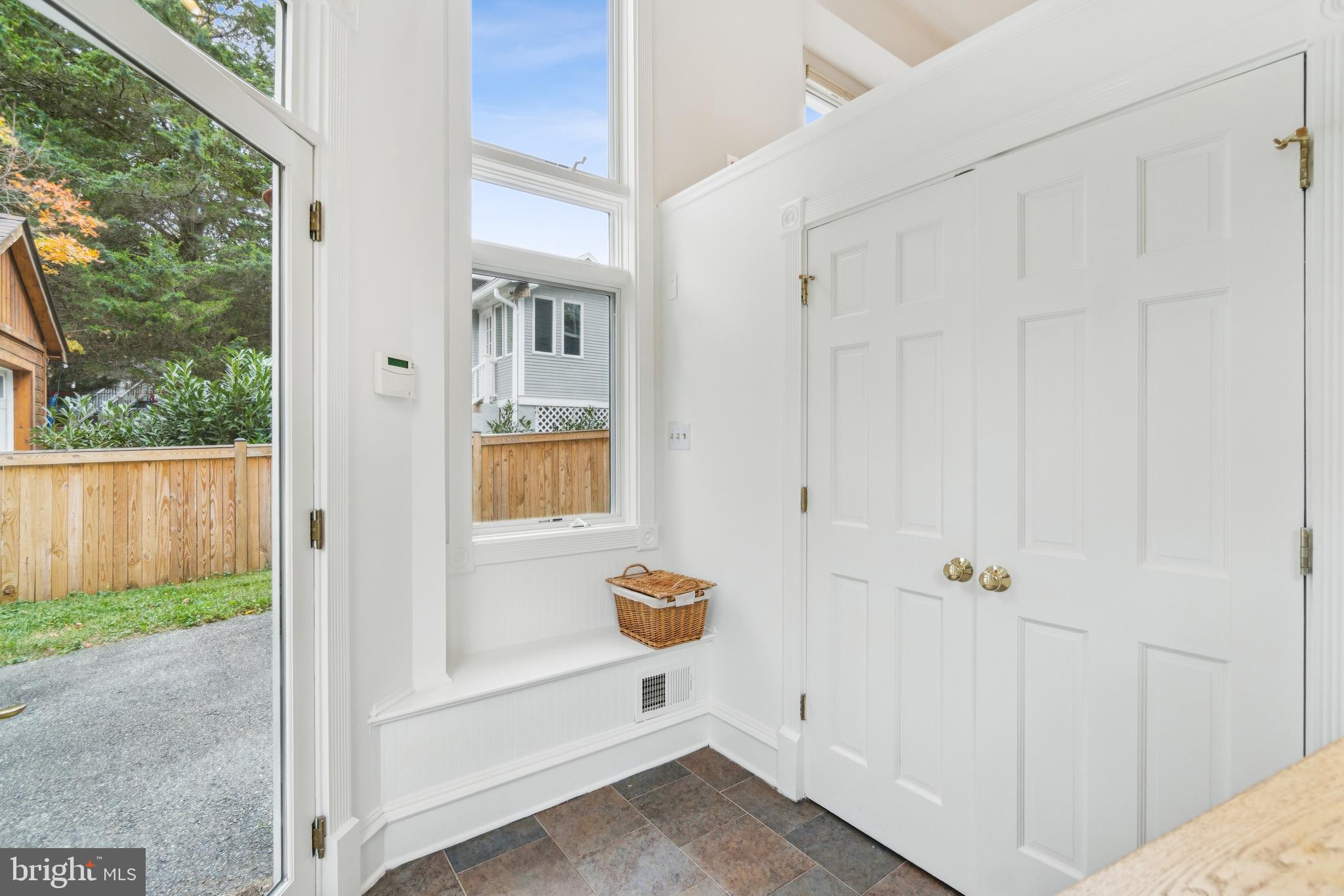 4406 Stanford Street Chevy Chase, MD 20815 - Photo 23 of 49 a view of a hallway with wooden floor and entryway