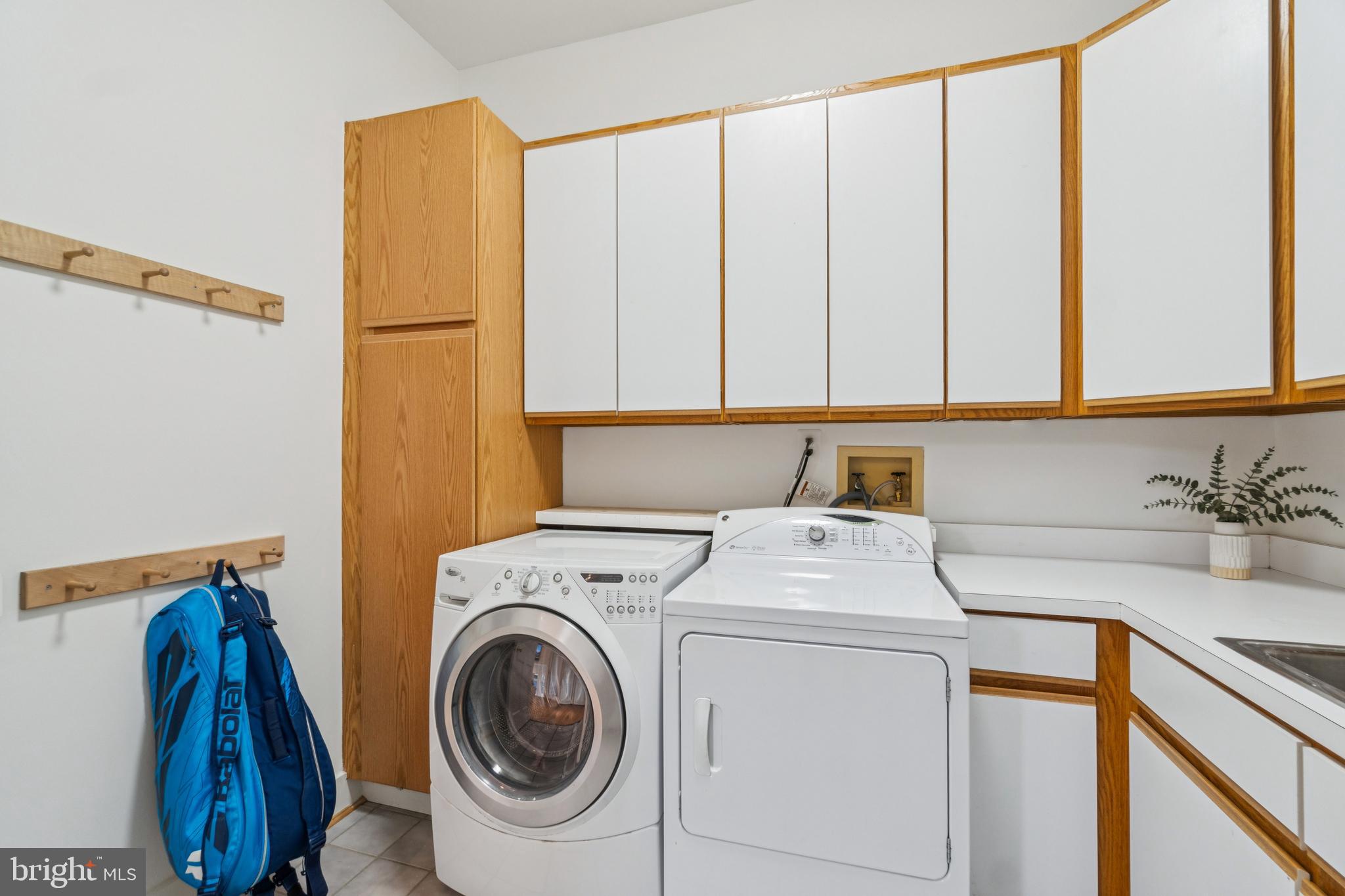 4406 Stanford Street Chevy Chase, MD 20815 - Photo 24 of 49 a utility room with dryer and washer