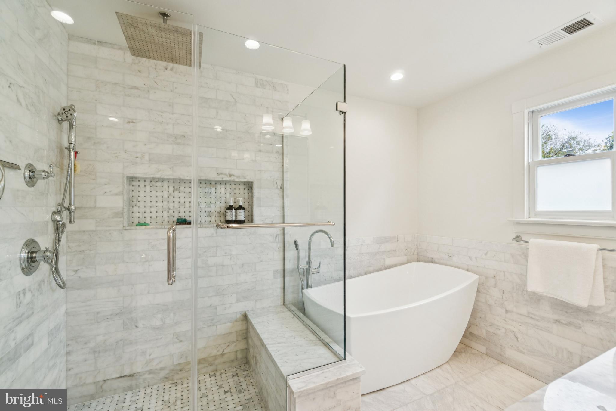 4406 Stanford Street Chevy Chase, MD 20815 - Photo 28 of 49 a bathroom with a bathtub and shower