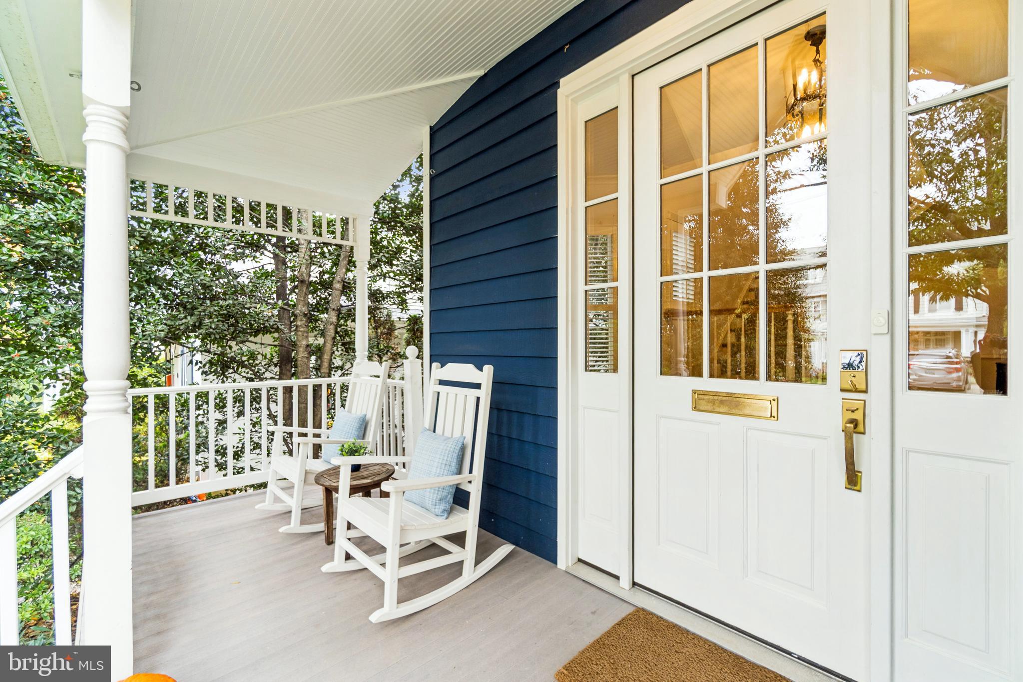 4406 Stanford Street Chevy Chase, MD 20815 - Photo 3 of 49 a view of a chair and table in the balcony