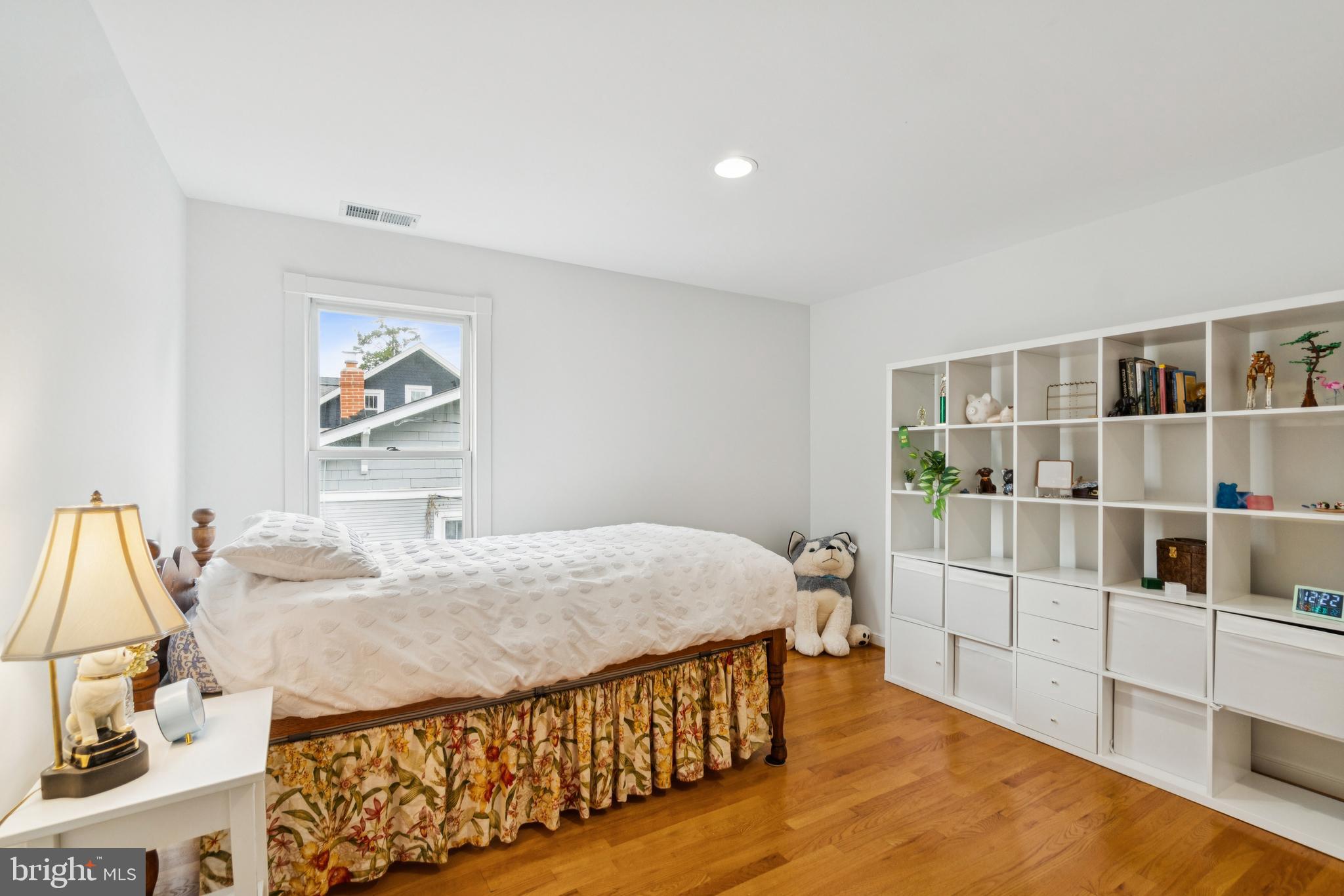 4406 Stanford Street Chevy Chase, MD 20815 - Photo 34 of 49 a bed room with a bed and a window