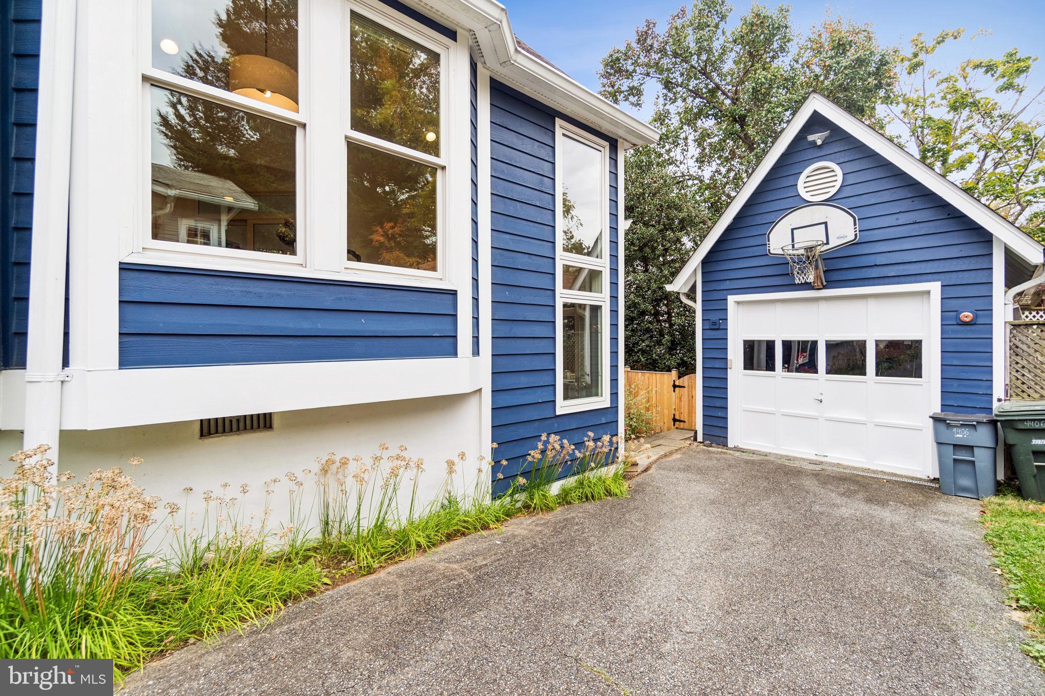 4406 Stanford Street Chevy Chase, MD 20815 - Photo 46 of 49 a view of a house with a yard and garden