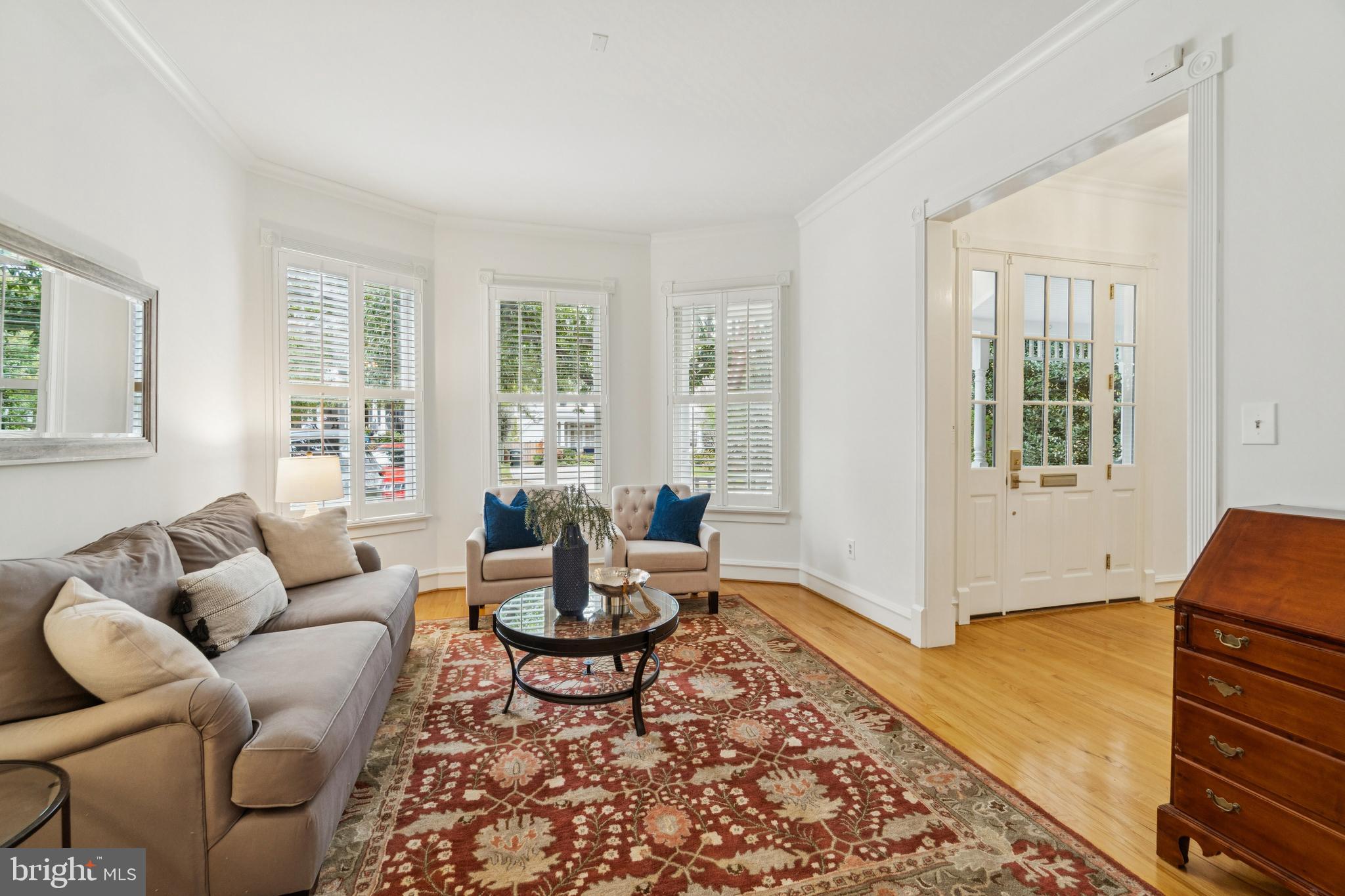 4406 Stanford Street Chevy Chase, MD 20815 - Photo 6 of 49 a living room with furniture and wooden floor