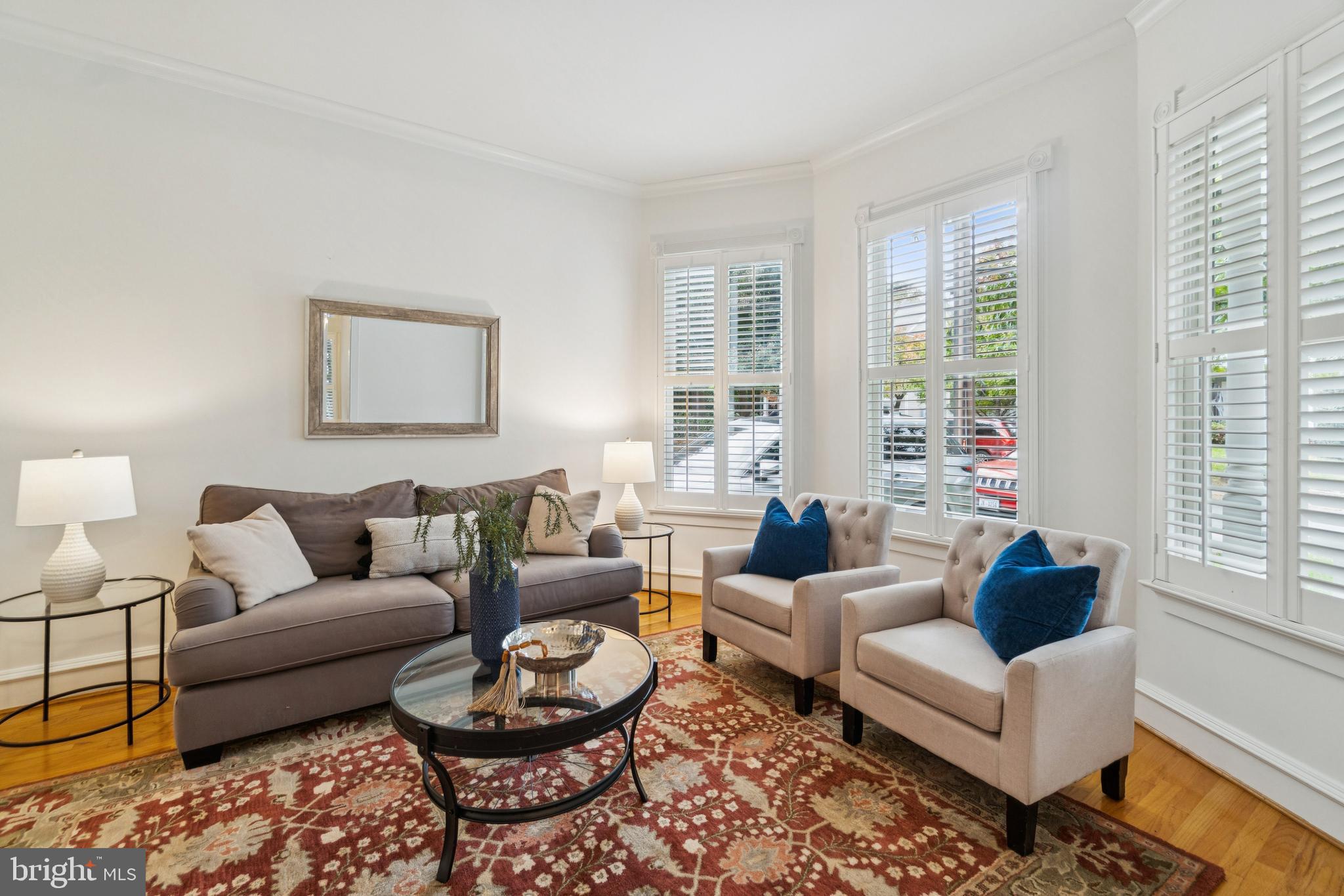 4406 Stanford Street Chevy Chase, MD 20815 - Photo 7 of 49 a living room with furniture and a large window