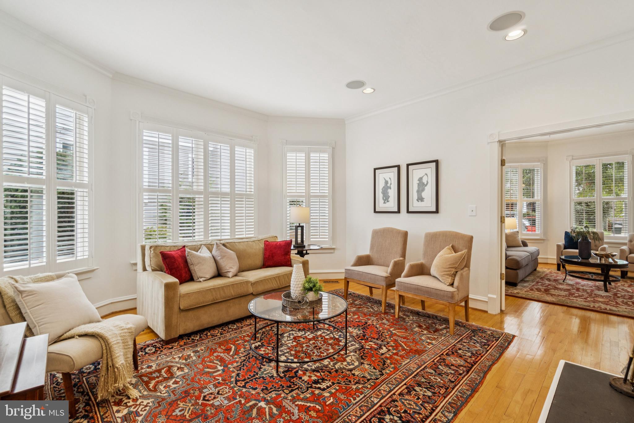 4406 Stanford Street Chevy Chase, MD 20815 - Photo 8 of 49 a living room with furniture wooden floor and a large window