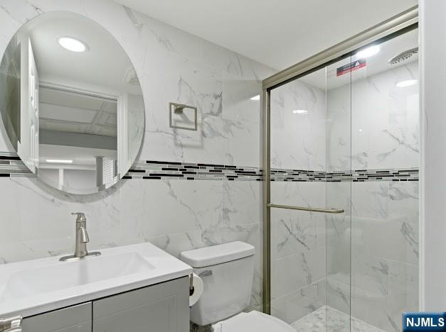 166 Summit Cross Rutherford, NJ 07070 - Photo 18 of 49 a bathroom with a toilet sink and shower