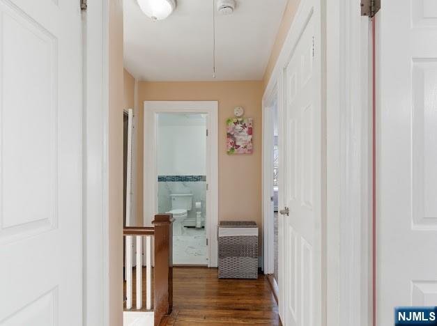166 Summit Cross Rutherford, NJ 07070 - Photo 21 of 49 a view of a hallway with a dining table and chairs
