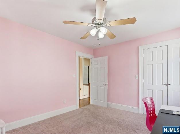 166 Summit Cross Rutherford, NJ 07070 - Photo 26 of 49 a view of a livingroom with a chandelier fan