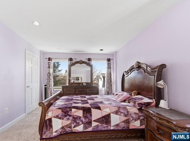 166 Summit Cross Rutherford, NJ 07070 - Photo 28 of 49 a bedroom with a bed and dresser