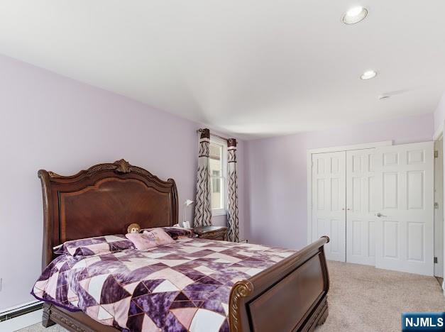 166 Summit Cross Rutherford, NJ 07070 - Photo 29 of 49 a bedroom with a bed and a window