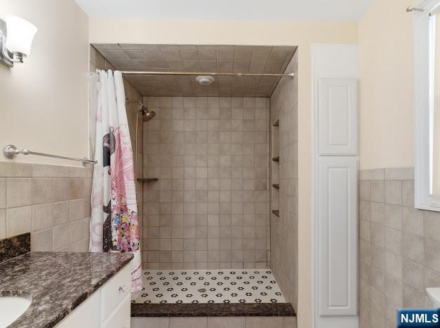 166 Summit Cross Rutherford, NJ 07070 - Photo 30 of 49 a bathroom with a granite countertop shower