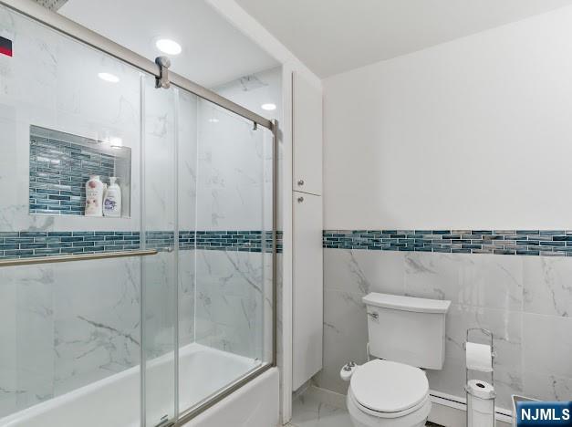 166 Summit Cross Rutherford, NJ 07070 - Photo 33 of 49 a bathroom with a shower a toilet and a shower