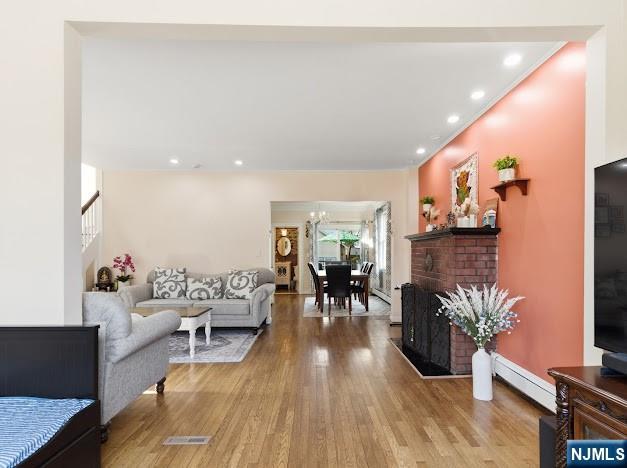 166 Summit Cross Rutherford, NJ 07070 - Photo 8 of 49 a living room with furniture and wooden floor