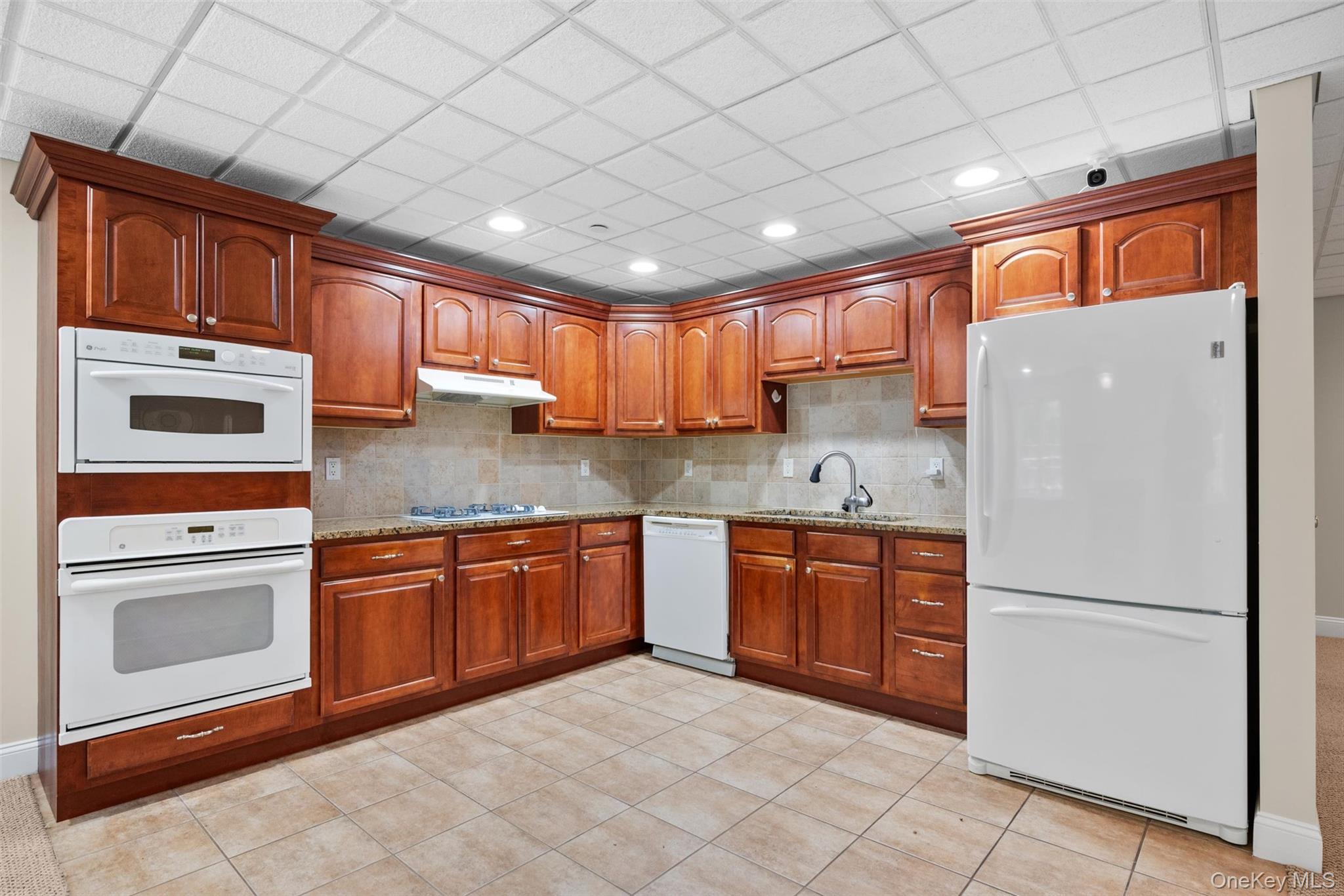 7 Farm Hollow Road Cornwall, NY 12553 - Photo 33 of 45 The kitchen offers cherry cabinets and granite counters and of course all the appliances stay.