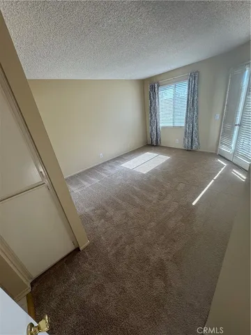 a bathroom with a double vanity sink mirror and toilet