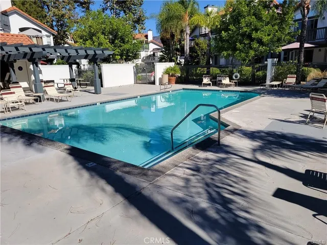 a view of a park with large trees