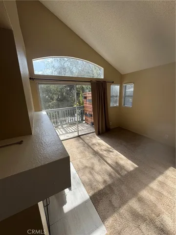 a view of a living room and entry way