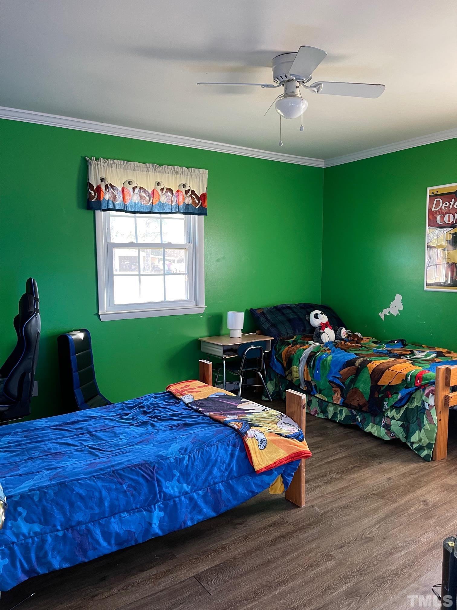 2009 Phillips Road Dunn, NC 28334 - Photo 14 of 17 a bed room with furniture and a window