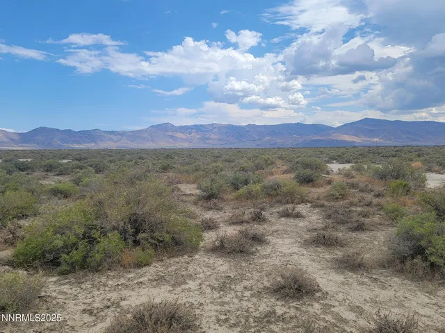 a view of an outdoor space and mountain view