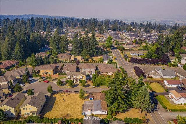 an aerial view of a city with lots of residential buildings