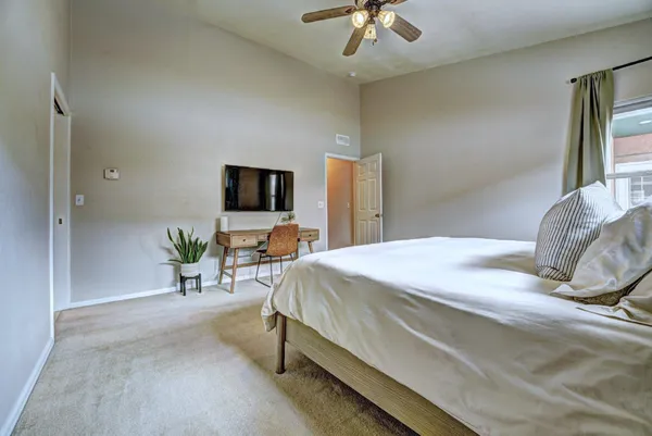 a bedroom with a bed and furniture