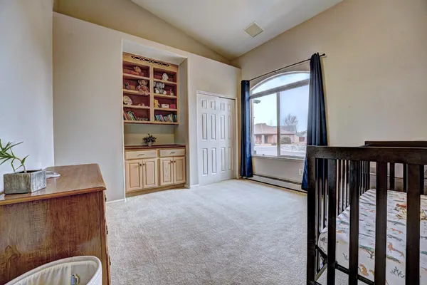 a view of workspace with furniture and window